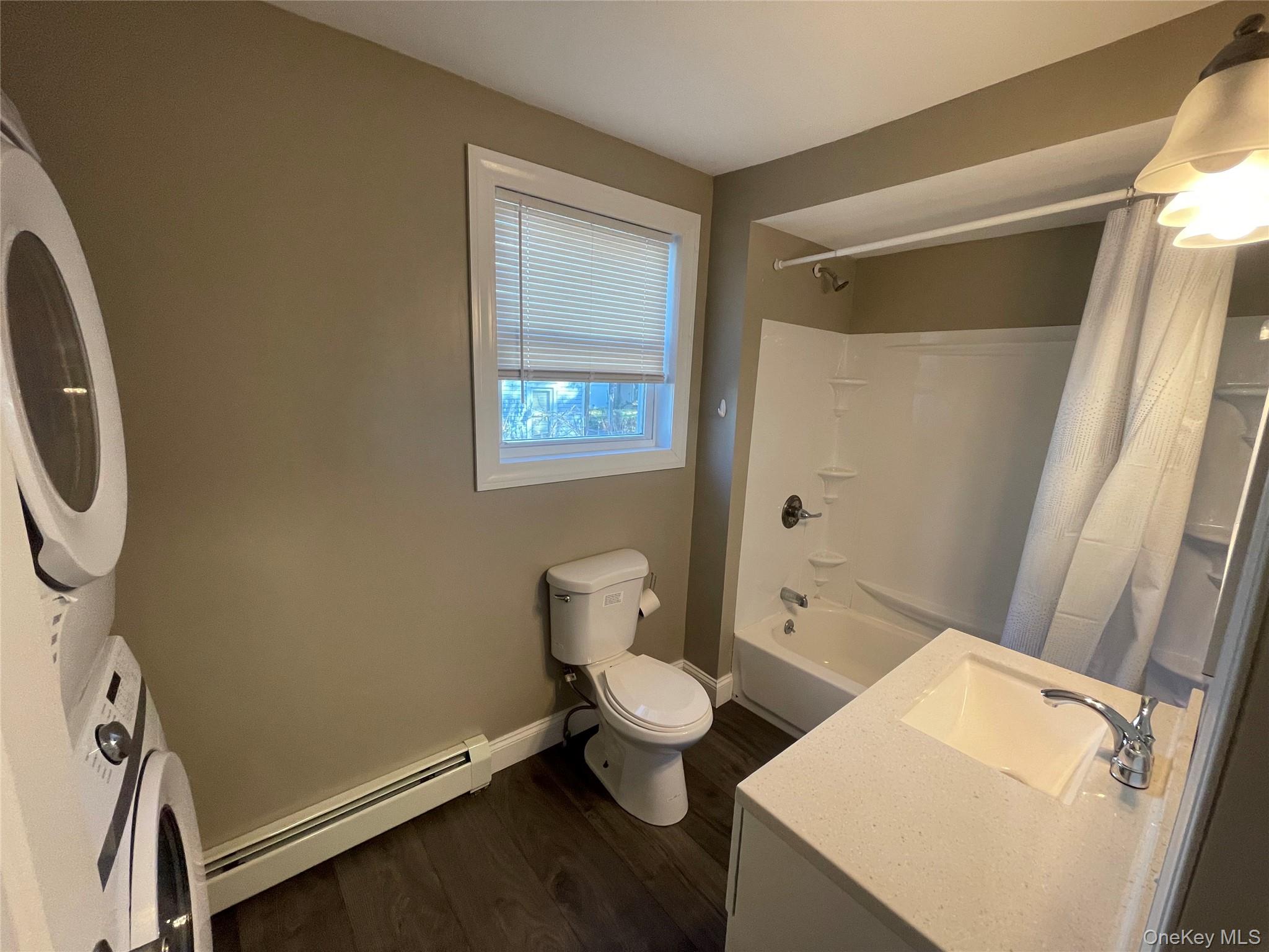 101 Delafield Street Poughkeepsie, NY 12601 - Photo 6 of 16 a bathroom with a toilet and a sink