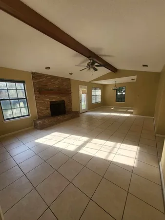 a view of an empty room and window