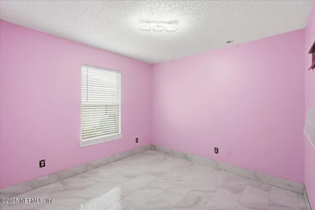 a view of room with hallway