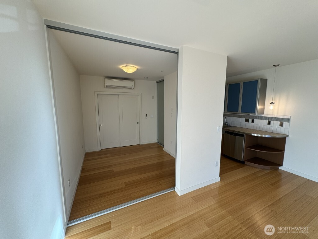 3104 Western Avenue, Unit 215 Seattle, WA 98121 - Photo 11 of 18 a view of a livingroom with wooden floor