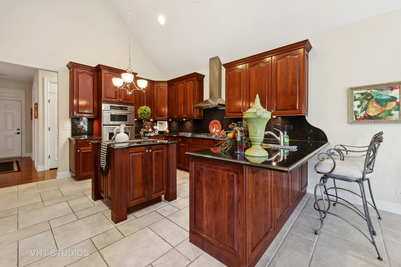16736 Julie Ann Lane Orland Park, IL 60467 - Photo 13 of 36 a kitchen with stainless steel appliances granite countertop a stove a sink and a microwave