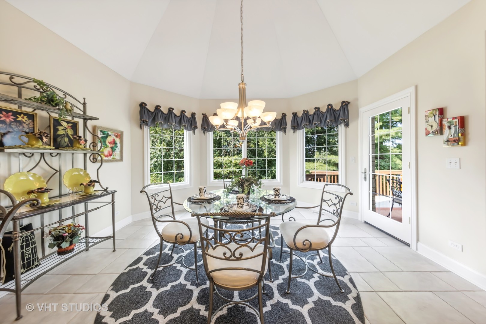 16736 Julie Ann Lane Orland Park, IL 60467 - Photo 15 of 36 a dining room with furniture a chandelier and window