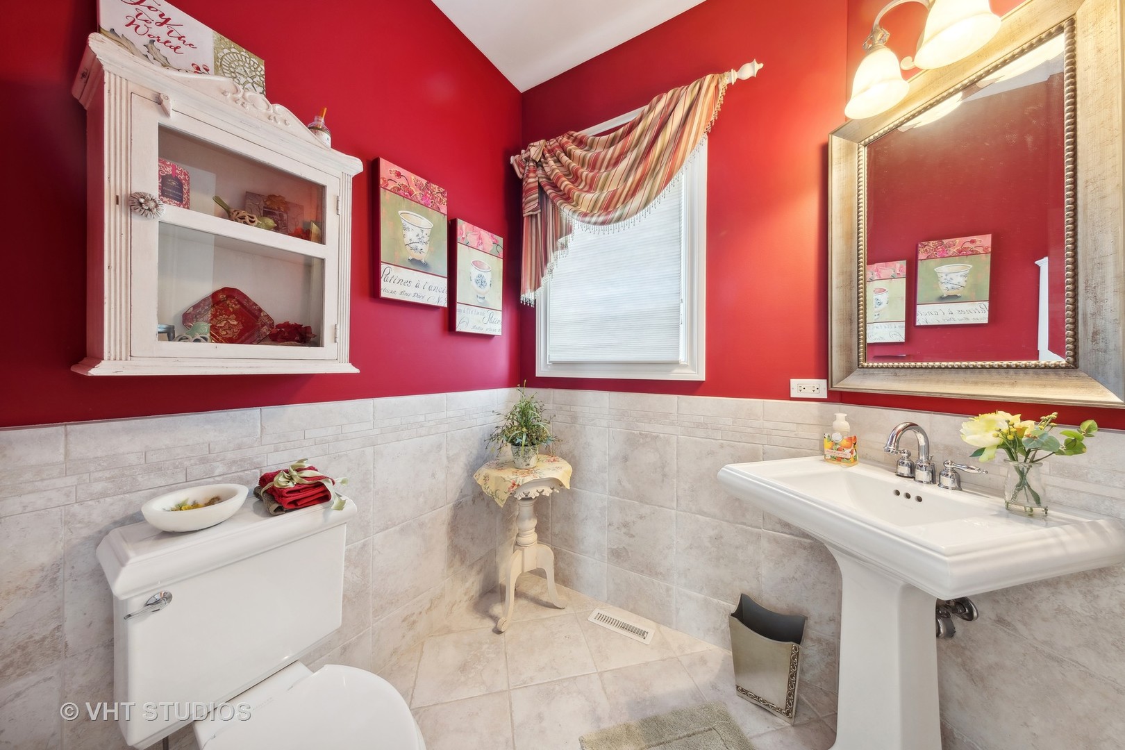 16736 Julie Ann Lane Orland Park, IL 60467 - Photo 16 of 36 a bathroom with a sink mirror and toilet