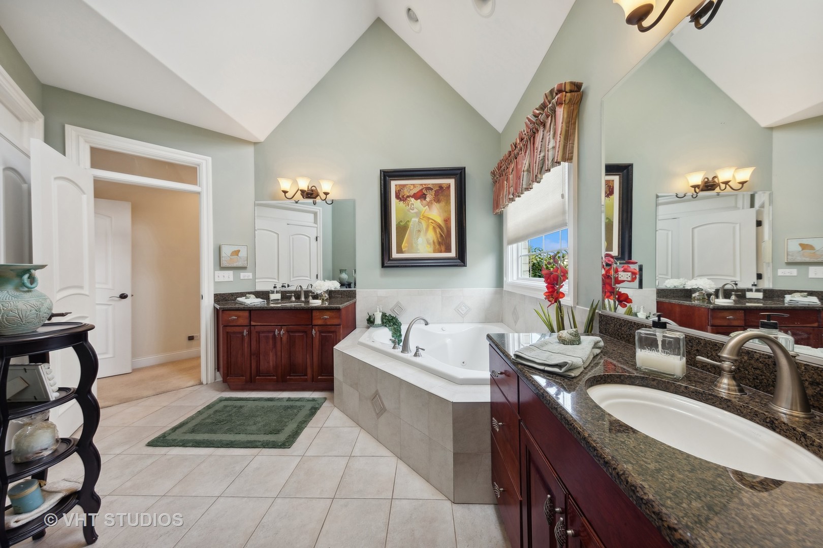 16736 Julie Ann Lane Orland Park, IL 60467 - Photo 18 of 36 a en suite bathroom with a granite countertop tub a double vanity sink a mirror and a shower