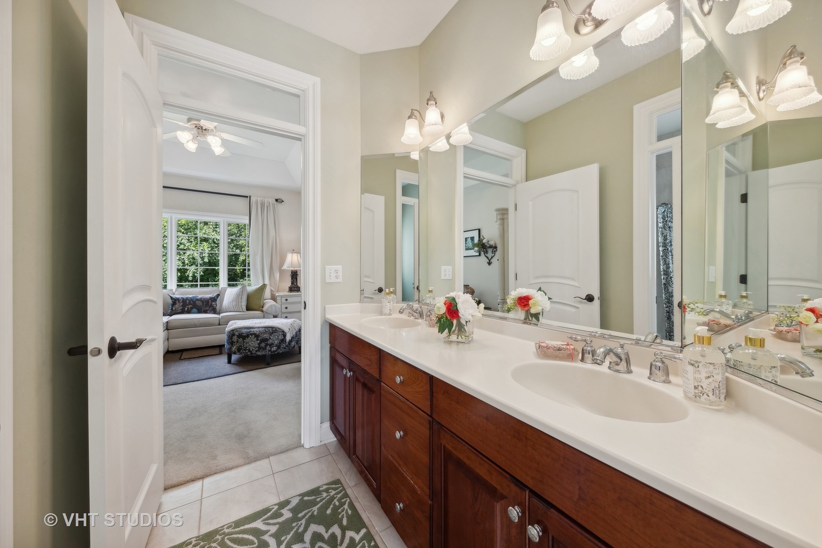 16736 Julie Ann Lane Orland Park, IL 60467 - Photo 21 of 36 a en suite bathroom with a double vanity sink a large mirror and a shower