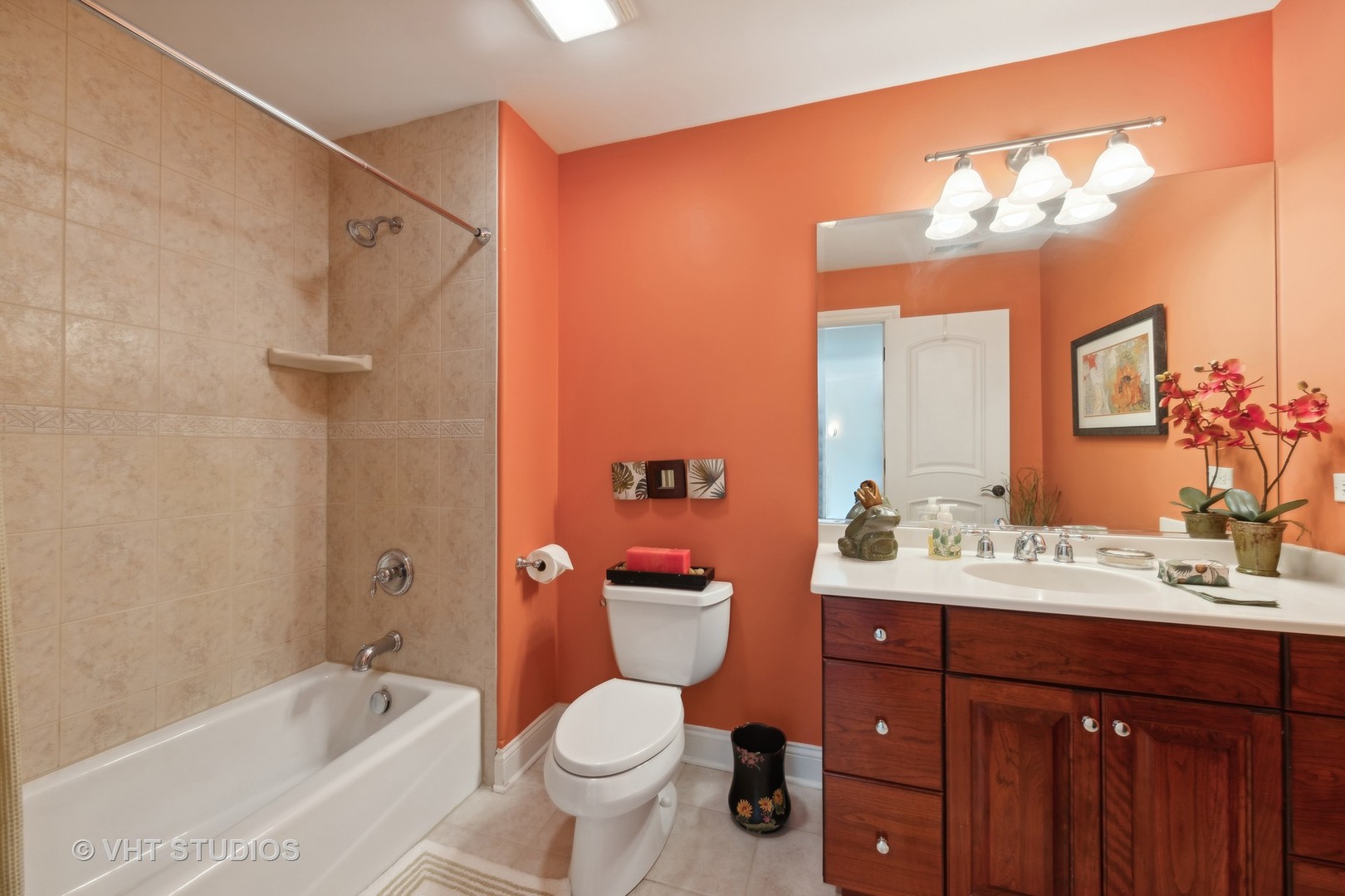 16736 Julie Ann Lane Orland Park, IL 60467 - Photo 27 of 36 a bathroom with a sink a toilet and shower