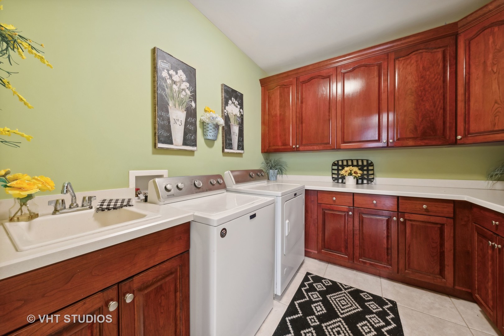 16736 Julie Ann Lane Orland Park, IL 60467 - Photo 28 of 36 a kitchen with a sink and cabinets
