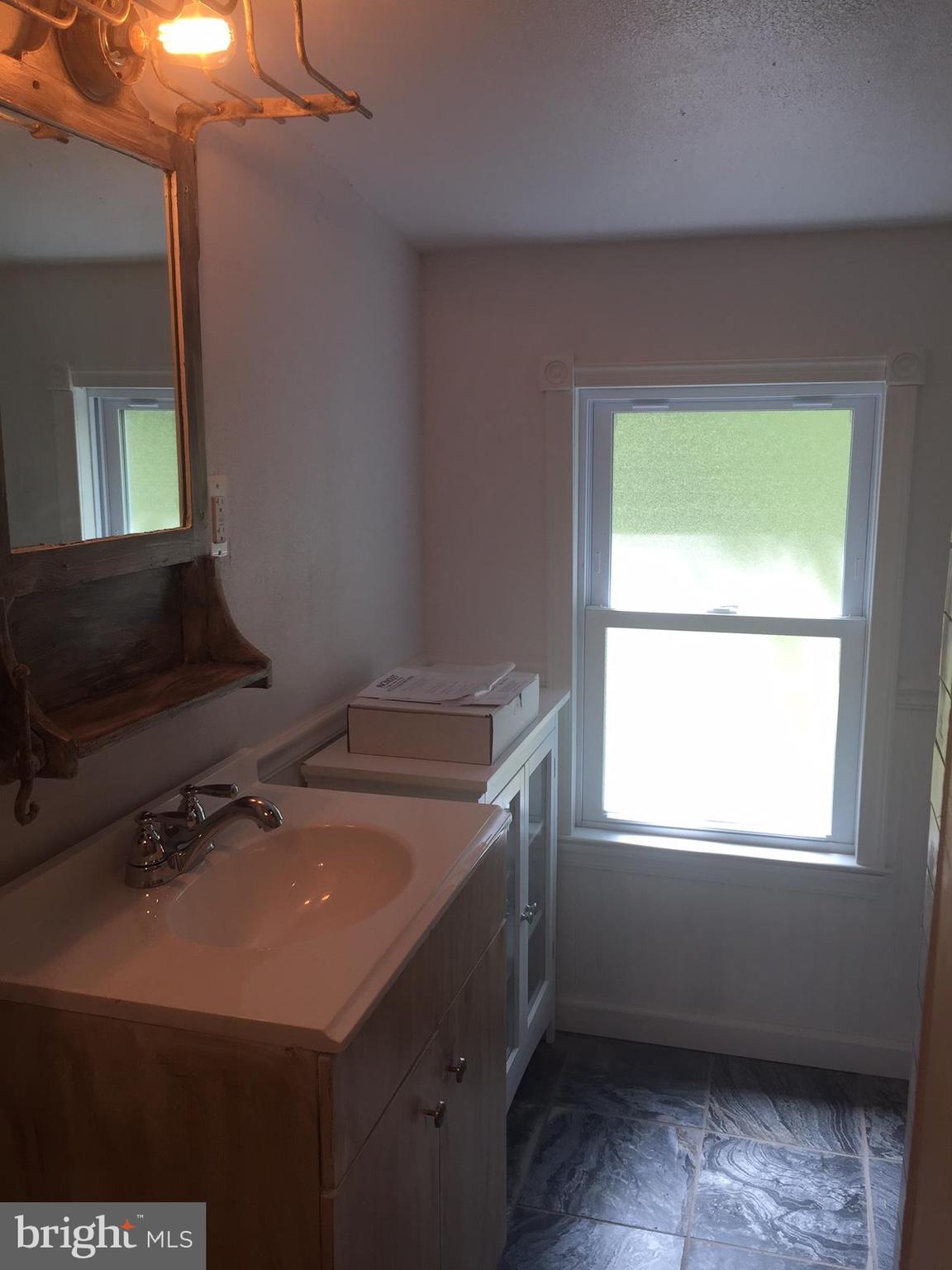 4609 B Dumfries Road Catlett, VA 20119 - Photo 14 of 16 a room with storage and utility