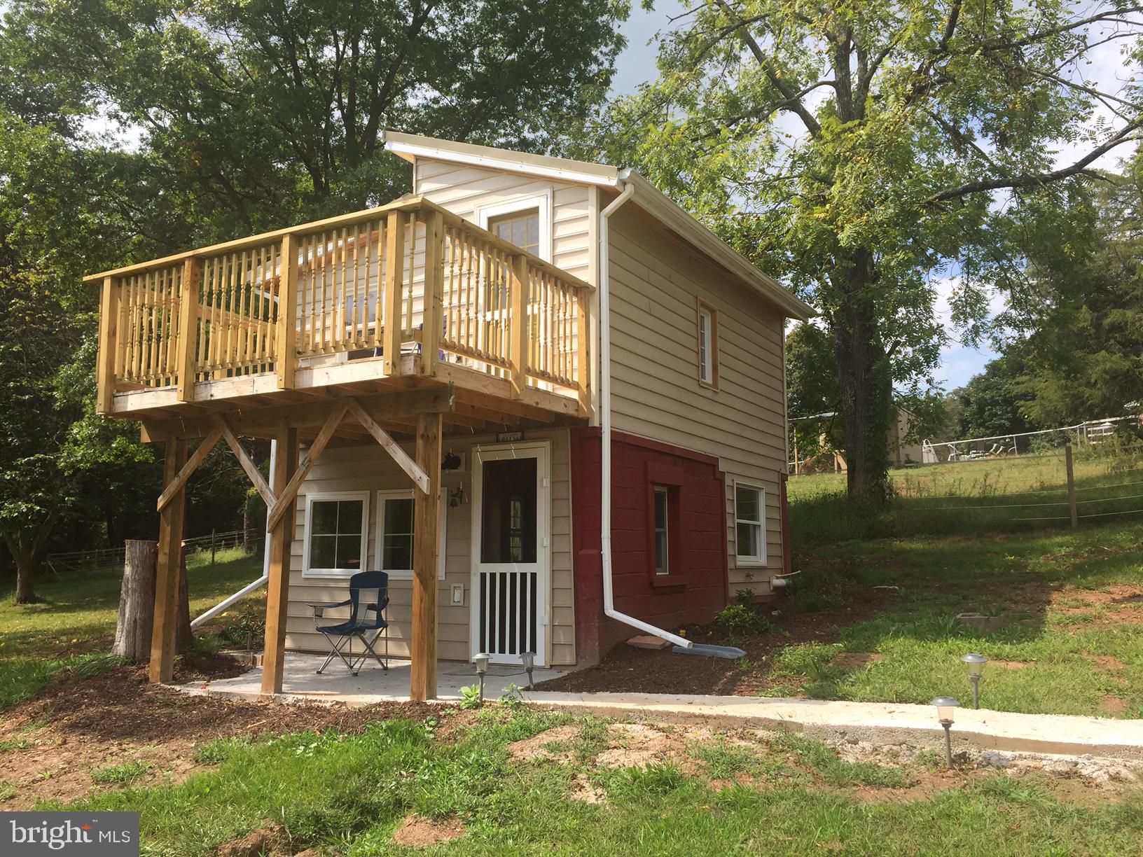 4609 B Dumfries Road Catlett, VA 20119 - Photo 2 of 16 a front view of a house with garden