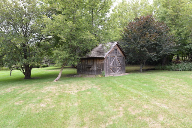 5N476 Brown Road St. Charles, IL 60175 - Photo 24 of 25 a backyard of a house with lots of green space