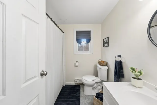 a view of a room with wooden walls