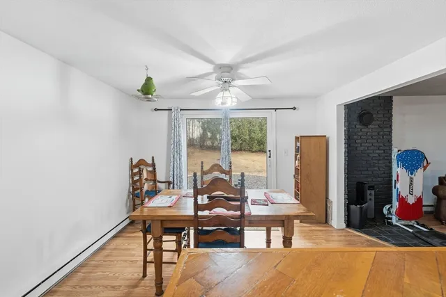 a living room with furniture window and a flat screen tv
