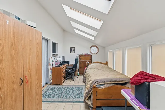 a bathroom with a sink mirror and vanity