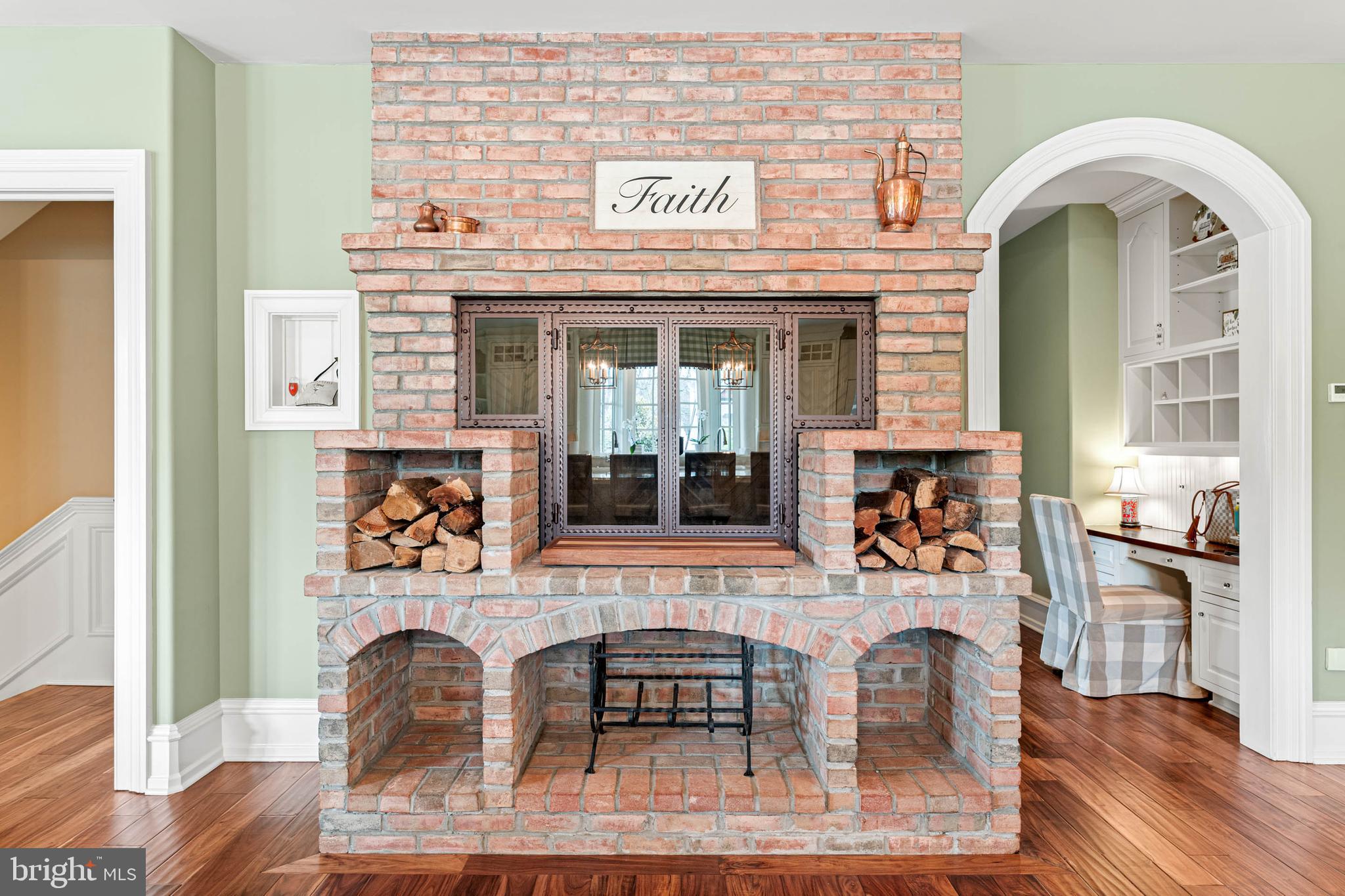 1075 South Leopard Road Berwyn, PA 19312 - Photo 31 of 111 Wood buring fireplace in kitchen