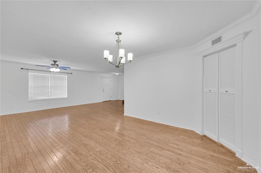 500 Wichita Avenue, Unit 17 McAllen, TX 78503 - Photo 3 of 16 a view of a chandelier in big room and chandelier