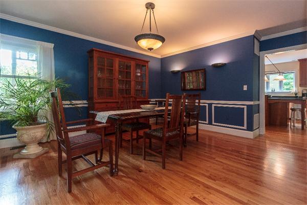 205 Marrett Road Lexington, MA 02421 - Photo 5 of 16 a view of a dining room with furniture and wooden floor