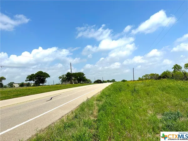a view of a city street from a building