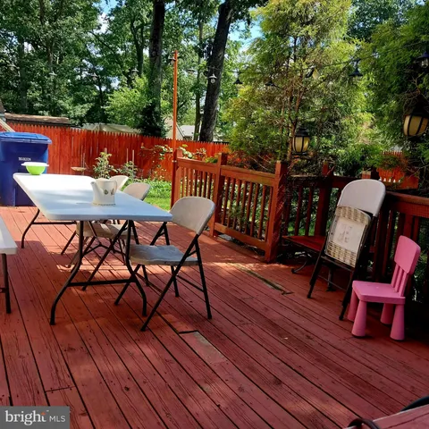 a view of a chairs on the roof deck