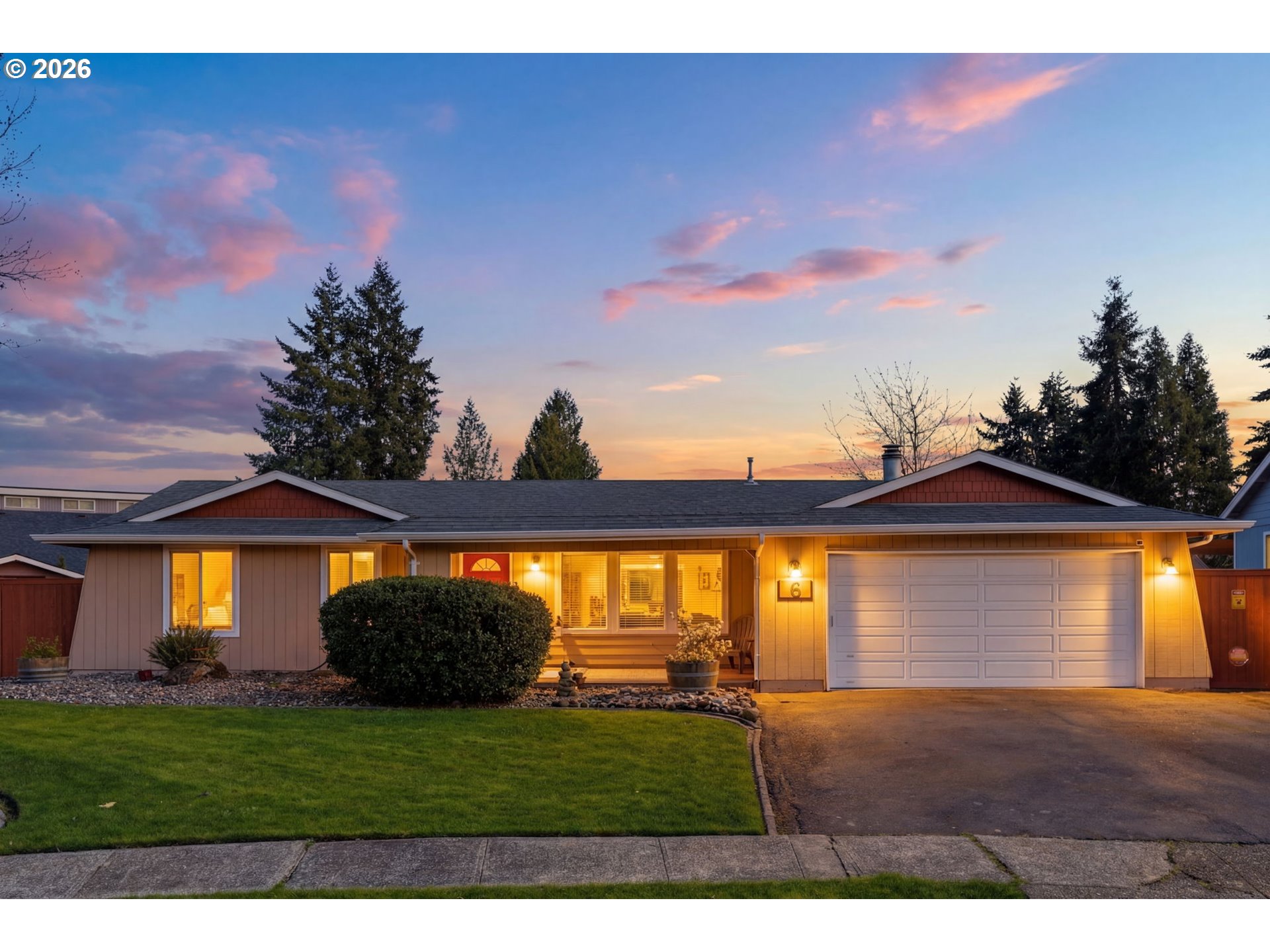 6 Dove Street Longview, WA 98632 - Photo 1 of 14 a front view of a house with a yard