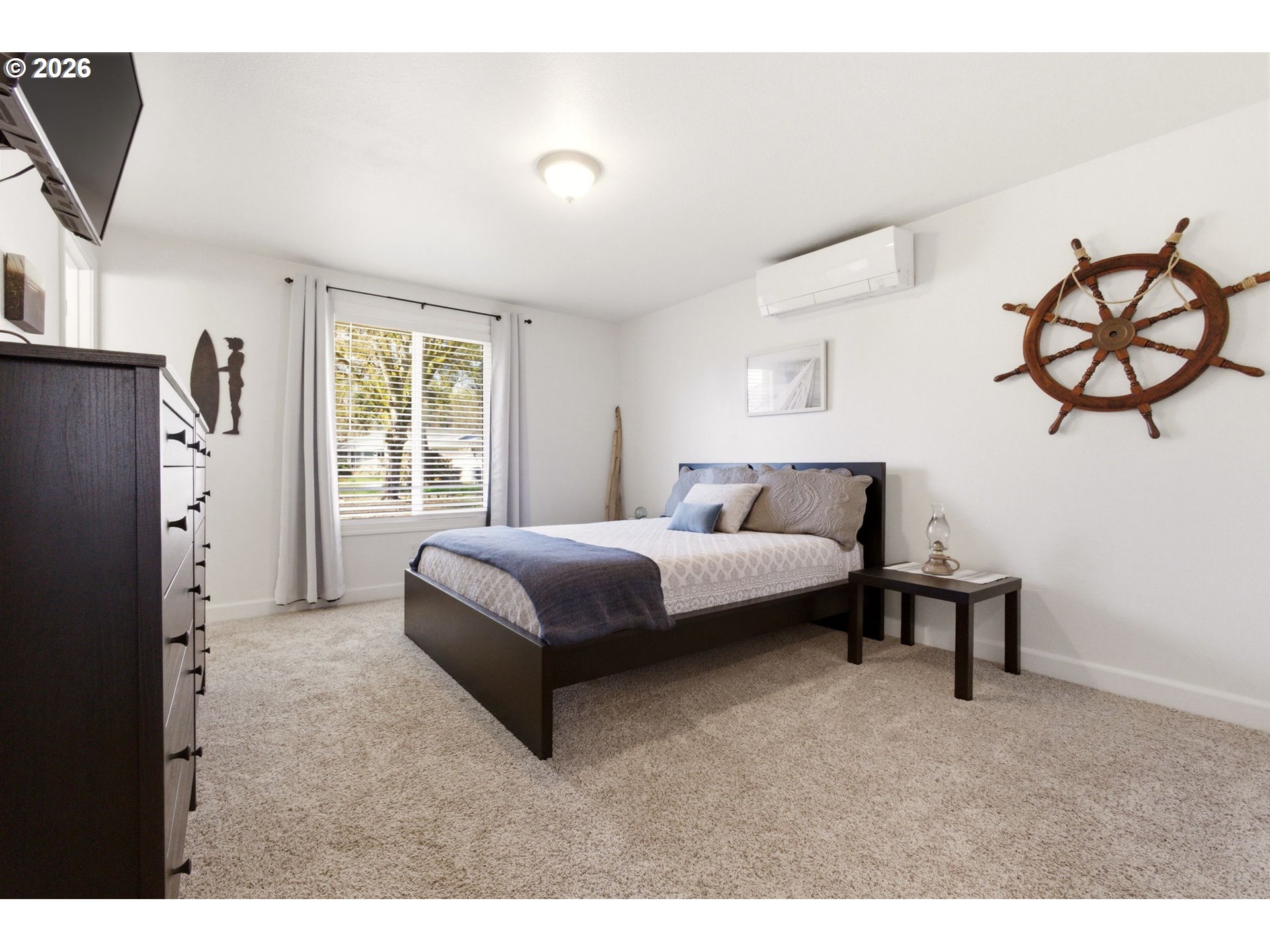6 Dove Street Longview, WA 98632 - Photo 11 of 14 a spacious bedroom with a bed and a window