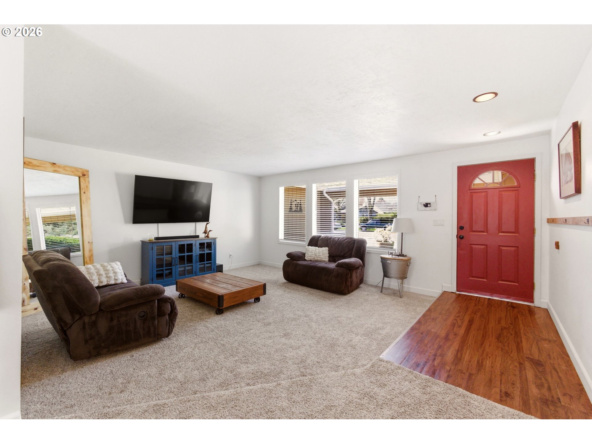 6 Dove Street Longview, WA 98632 - Photo 3 of 14 a living room with furniture and a flat screen tv