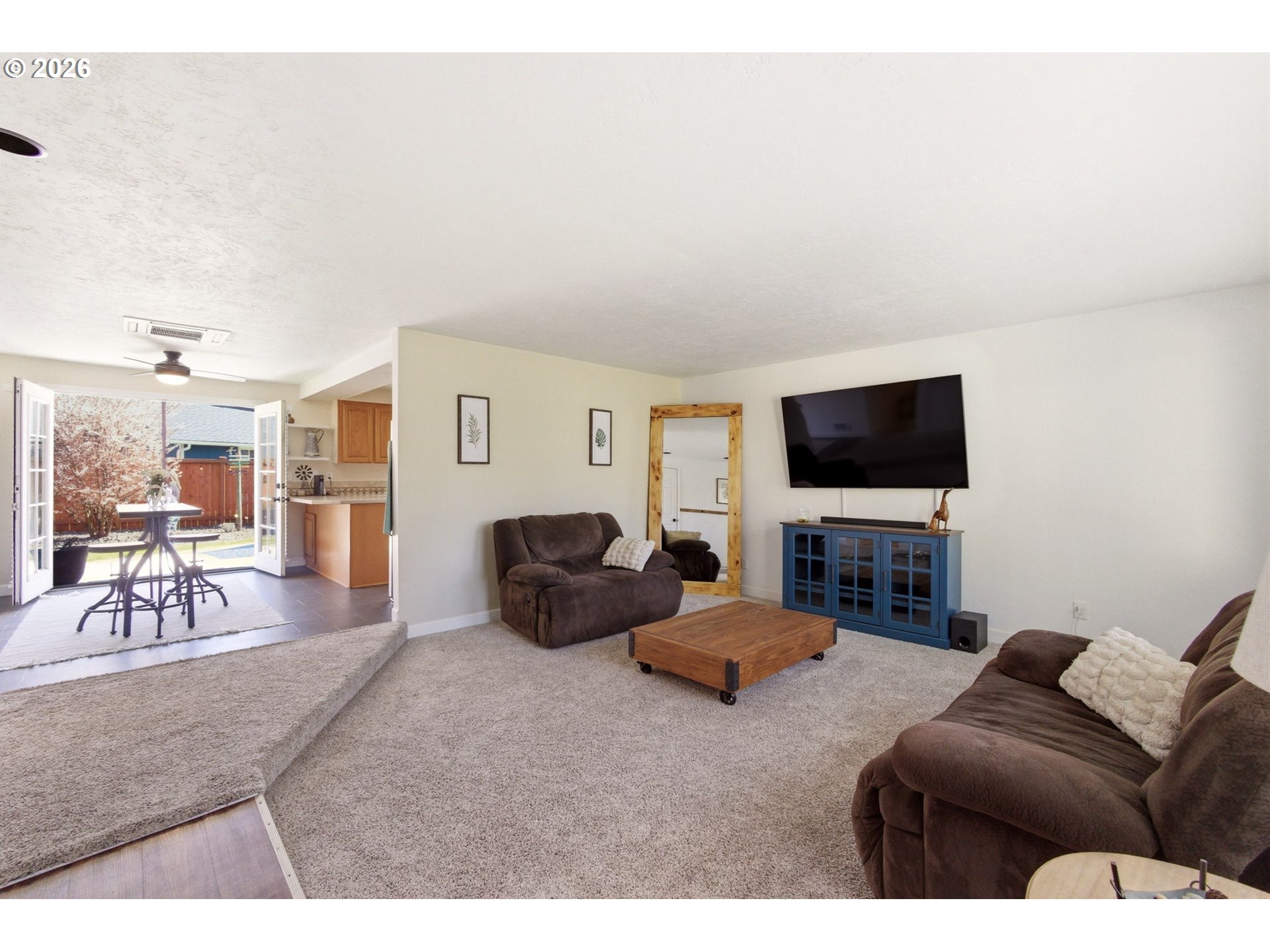 6 Dove Street Longview, WA 98632 - Photo 5 of 14 a living room with furniture and a flat screen tv
