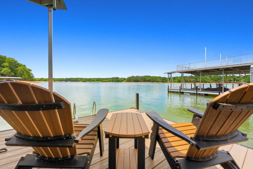 707 Vickery Street Extension Hartwell, GA 30643 - Photo 49 of 50 A tranquil lakeside retreat with a private dock beckons, offering a serene escape.