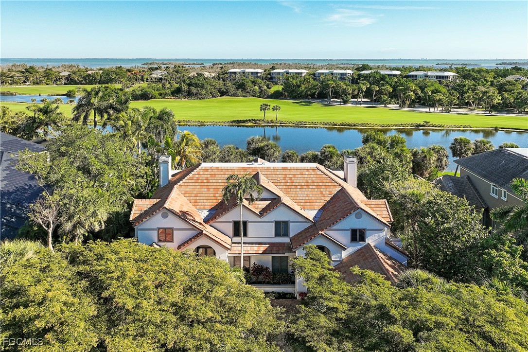 an aerial view of a house with a garden