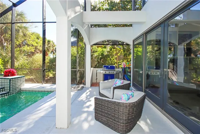 a outdoor living space with patio furniture and a potted plant