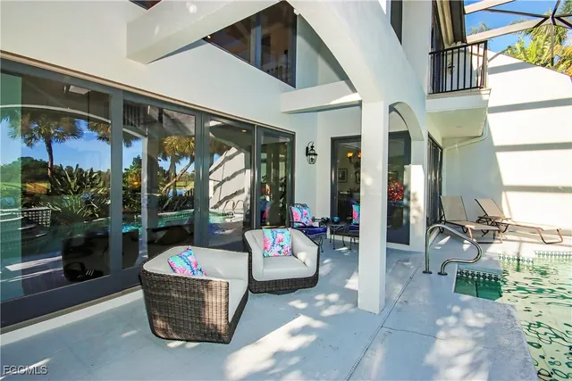 a view of a lounge chairs in the patio