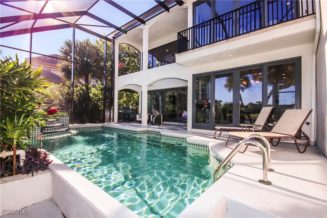 2548 Wulfert Road Sanibel, FL 33957 - Photo 15 of 36 a view of a lounge chairs in the patio