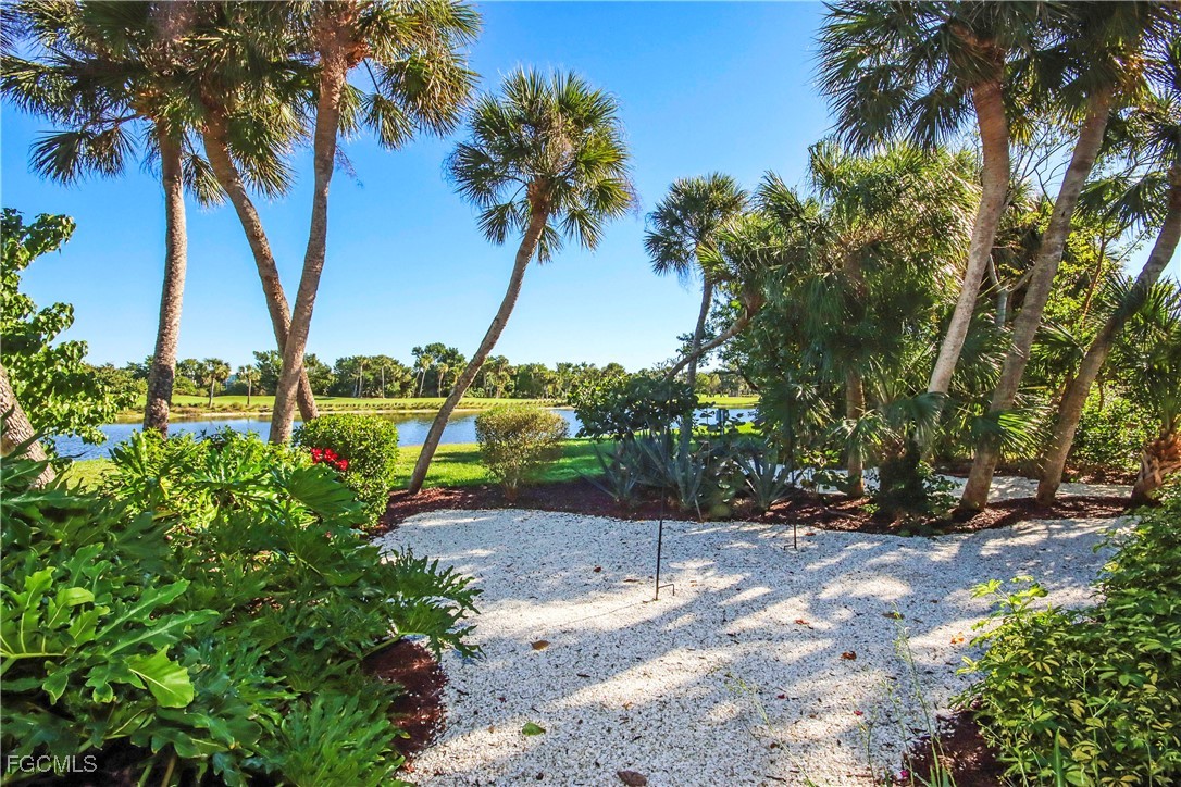 2548 Wulfert Road Sanibel, FL 33957 - Photo 32 of 36 a view of a yard with palm tree