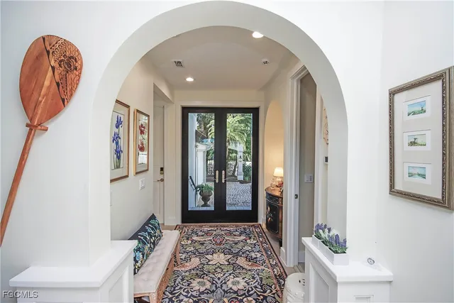 a living room with fireplace furniture and a flat screen tv