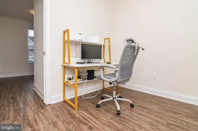 a view of a livingroom with furniture