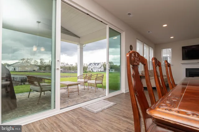 a view of a patio with a yard