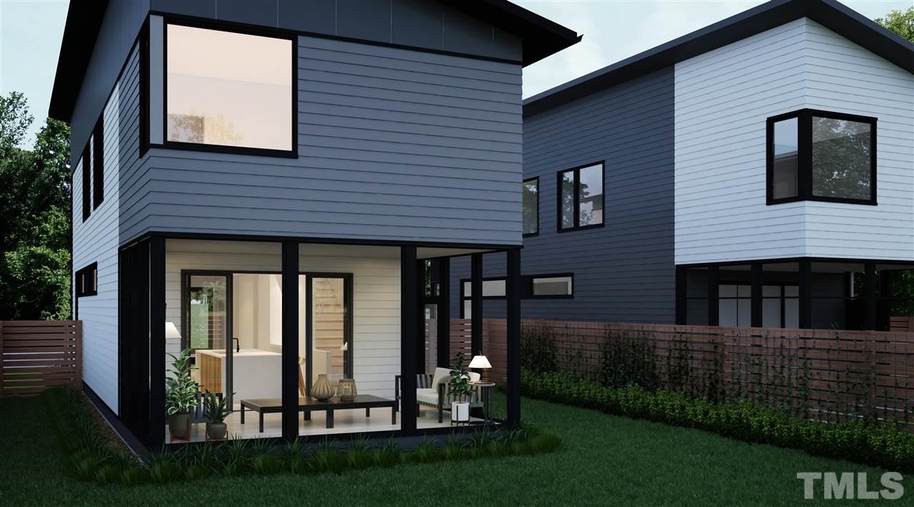 1212 Garner Road Raleigh, NC 27610 - Photo 3 of 22 a view of brick house with a yard