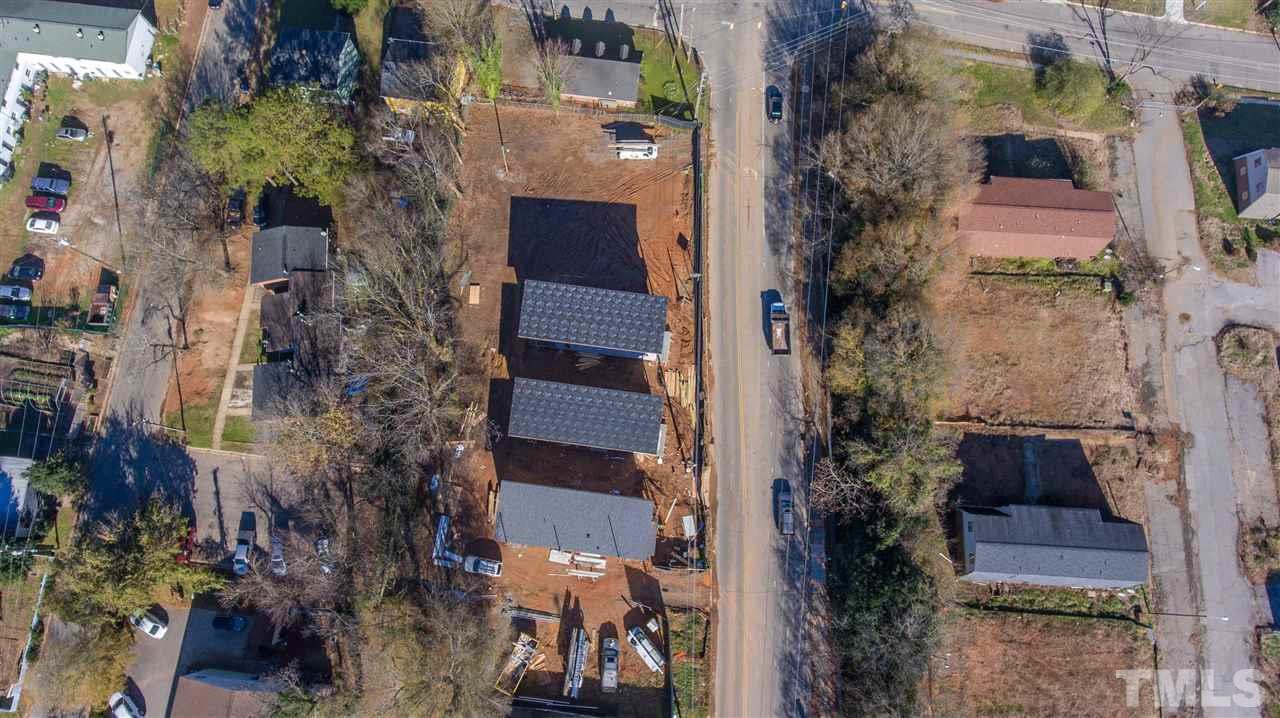 1212 Garner Road Raleigh, NC 27610 - Photo 8 of 22 an aerial view of a house with a yard