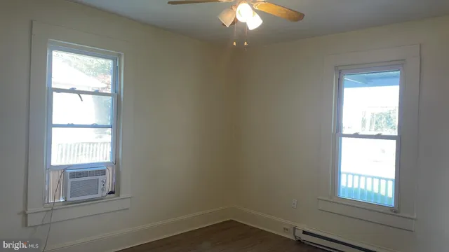 a kitchen with granite countertop a sink and a stove top oven