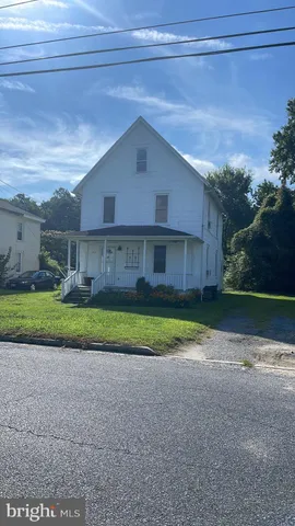 a view of outdoor space yard and front view of a house