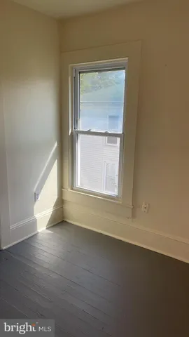 an empty room with a workbench