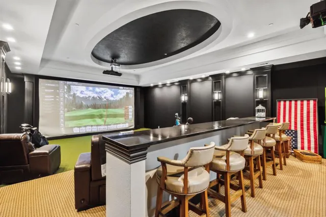 a large kitchen with stainless steel appliances granite countertop a large island in the center