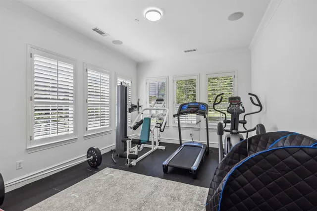 a room with a chair and a dresser