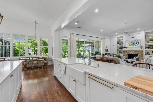 a kitchen with counter top space and cabinets
