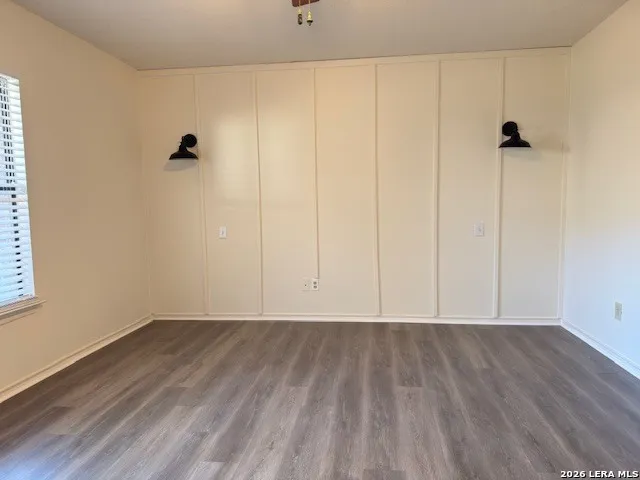a view of room with hardwood floor