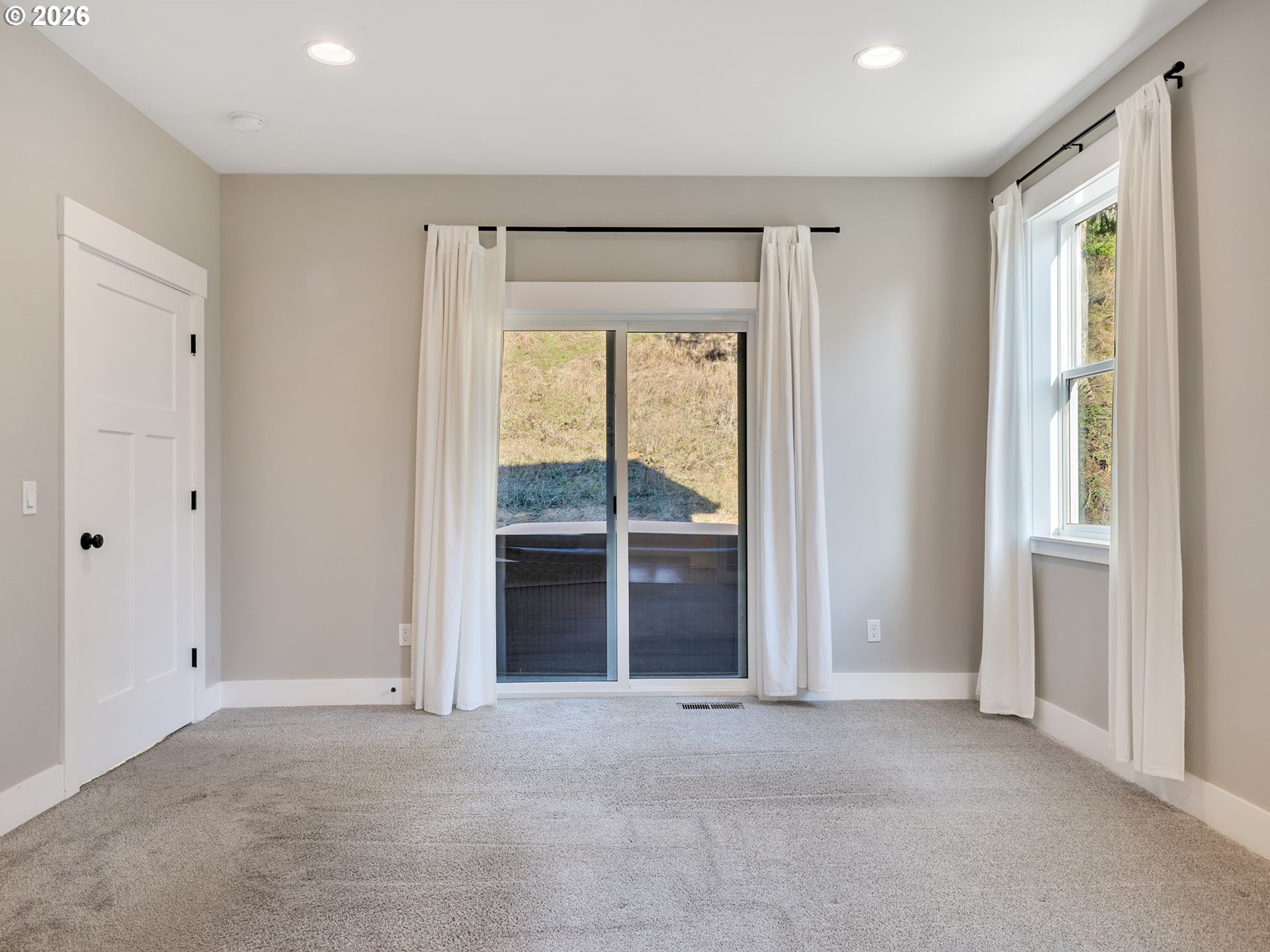 37027 Danner Ridge Lane Astoria, OR 97103 - Photo 26 of 46 a view of an empty room with a window