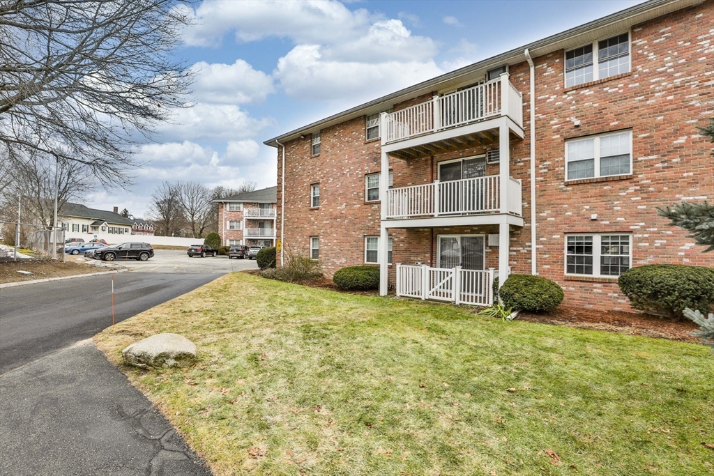 a view of a building with a garden
