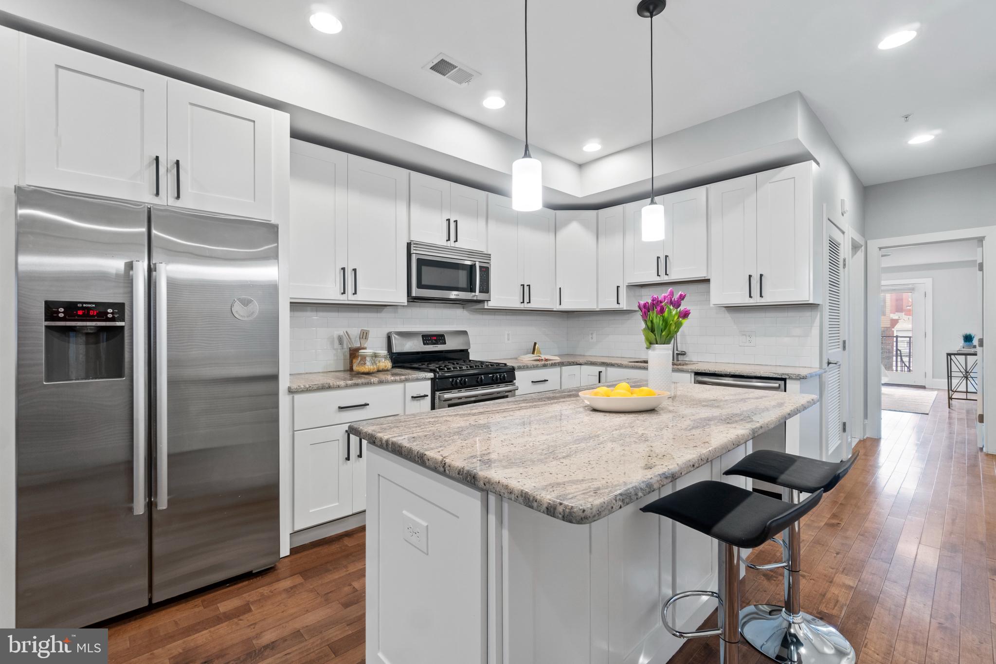 1130 Columbia Road Northwest, Unit 3 Washington, DC 20009 - Photo 14 of 40 Large Stainless/Granite Kitchen