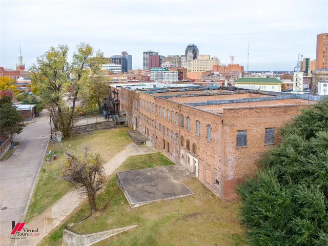 a view of a building with a street