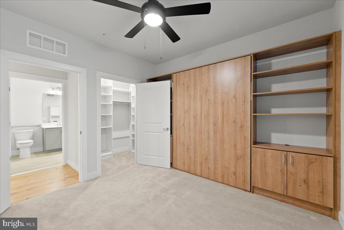 2320 Field Point Road, Unit 103 Herndon, VA 20171 - Photo 12 of 22 a view of an empty room with a cabinet