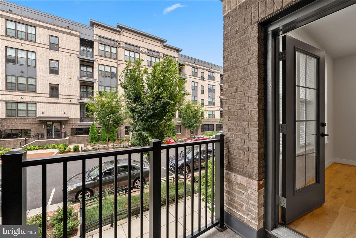 2320 Field Point Road, Unit 103 Herndon, VA 20171 - Photo 18 of 22 a view of a building from a balcony